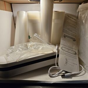 Vacuum Sealer Machine with Accessory Rolls - White